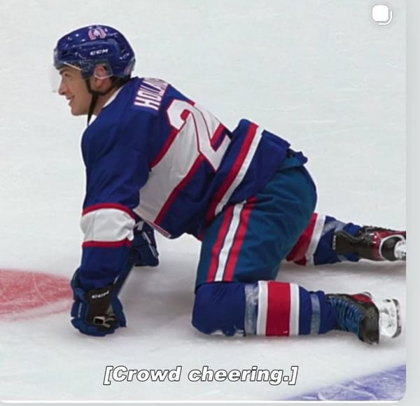 a still from the hockey show (you know the one) (Heated Rivalry) with the caption "crowd cheerin