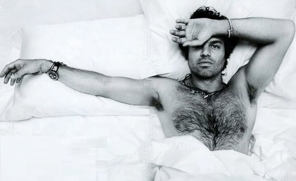 Helen Mirren lights Stanley Tucci's cigar and winks...